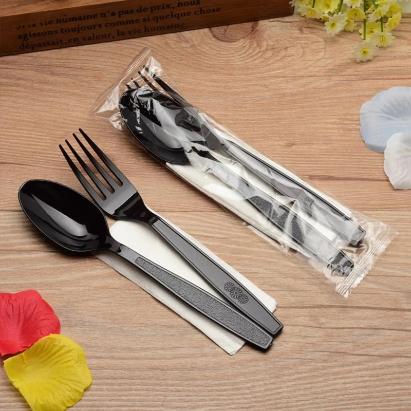 packaged black spoon fork
